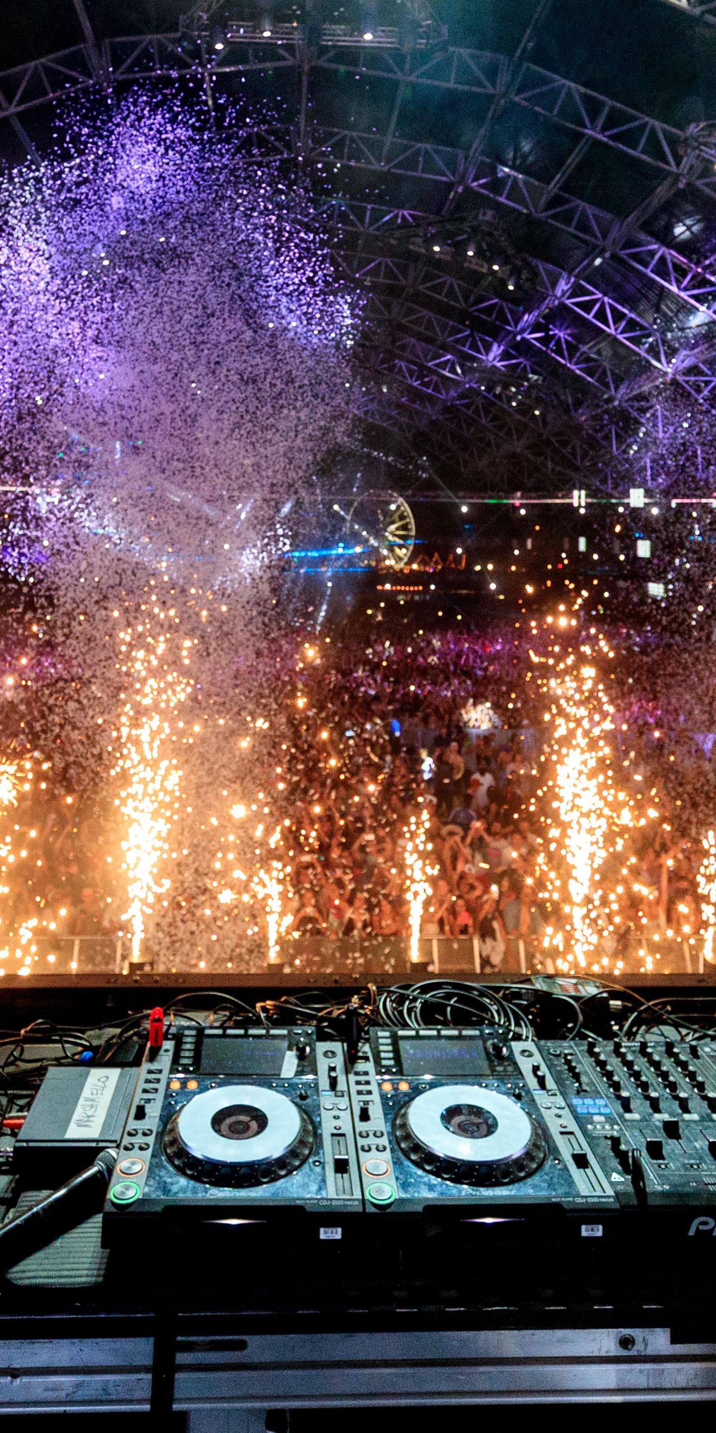 High-energy crowd at DJ event